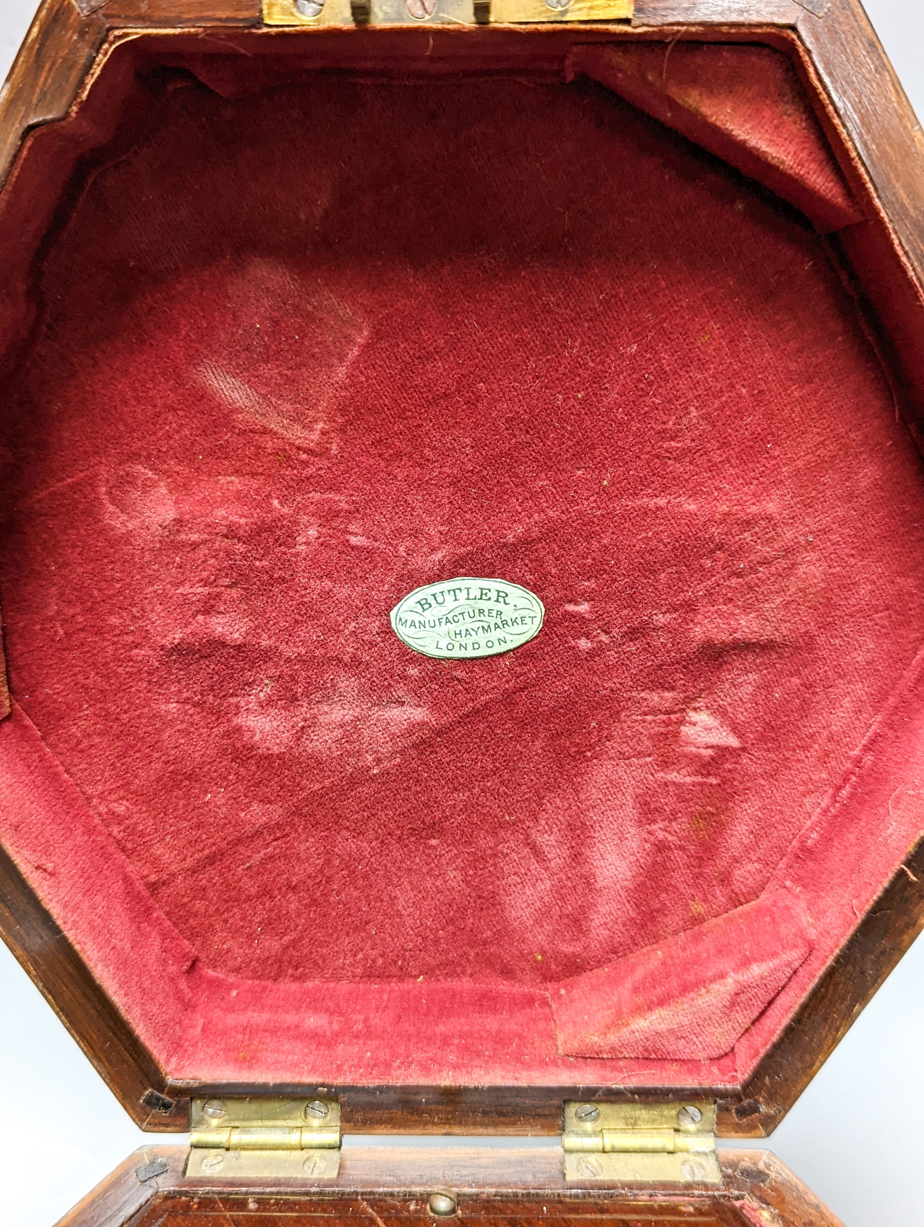 A 19th century rosewood 48 button cased concertina, by Butler, Haymarket, London, rosewood box, damage